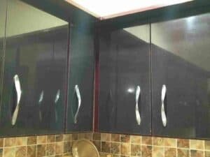 black kitchen cabinets with tiles